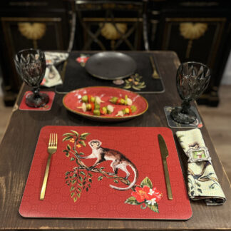 Red monkey table mat with cutlery