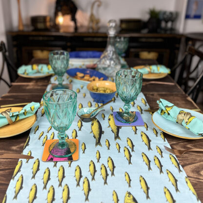 Sardine table runner with glasses and plates