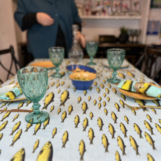 Sardine tablecloth with glasses and napkins